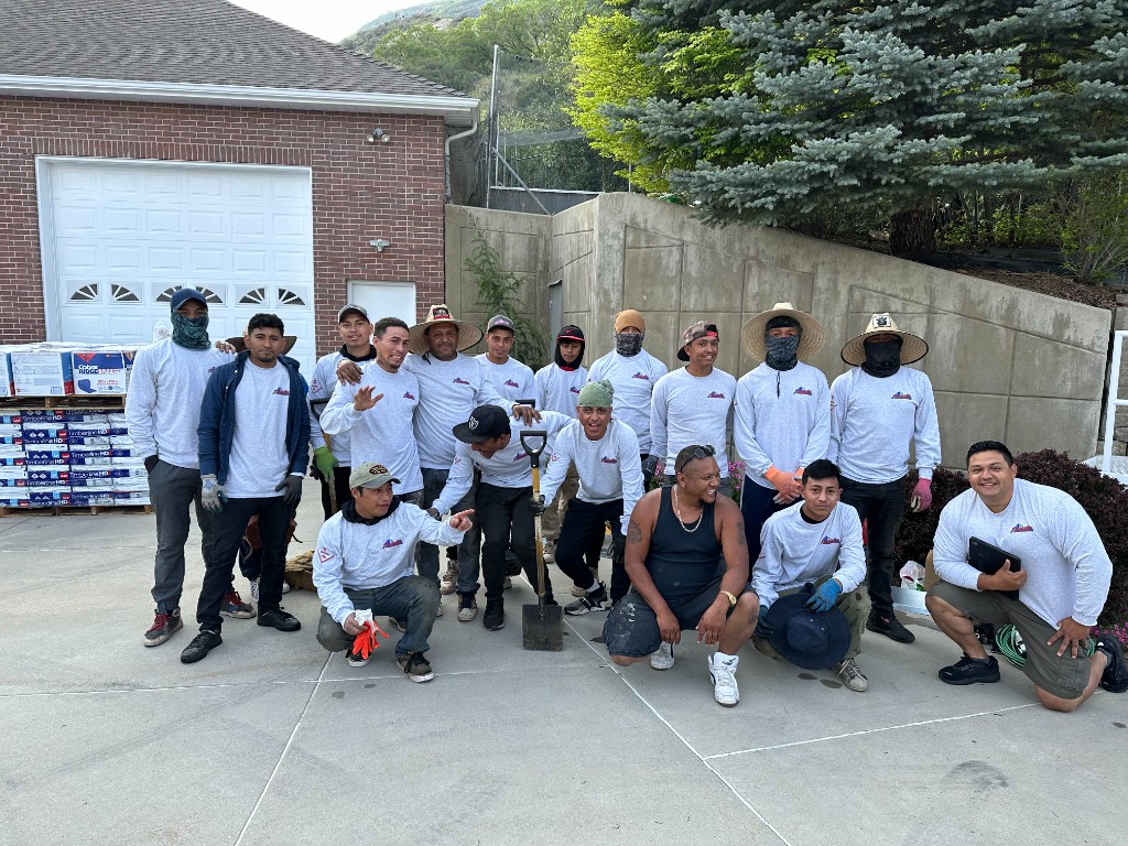 Olympus Roofing crew gathered together for a group photo